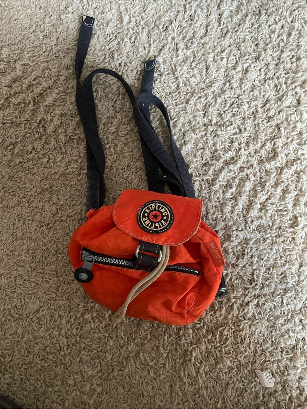 Kipling Bright Orange Mini Backpack with Black Straps.Small